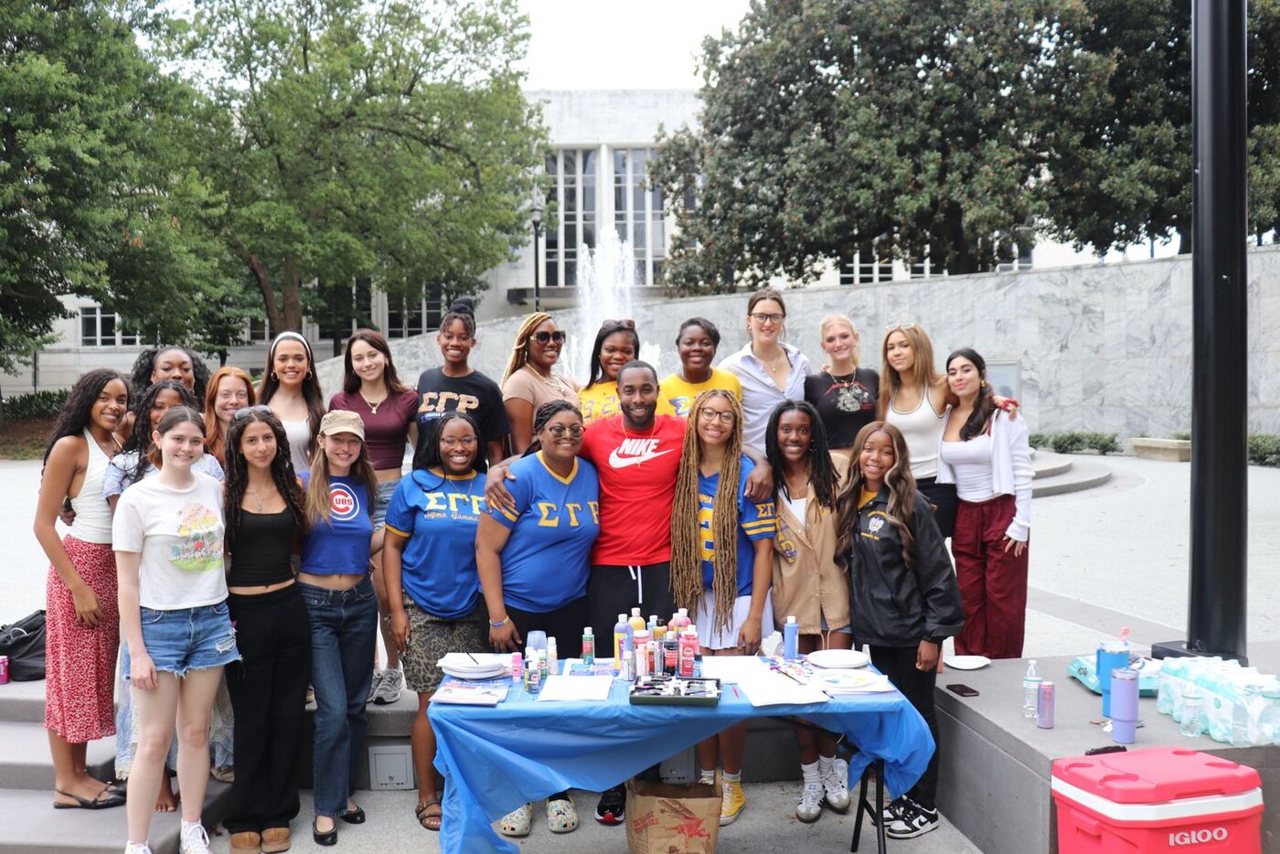 Group photo with Sigma Gamma Rho sorority volunteers at a campus event